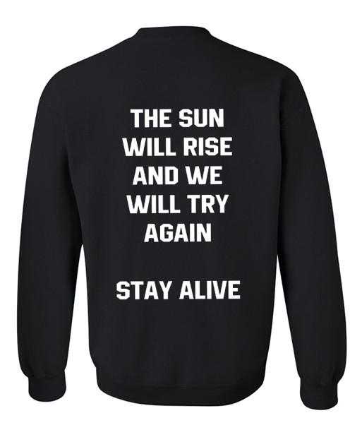 the sun will rise and we will try again sweatshirt back