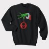 Grinch hand holding skull Christmas Sweatshirt KM